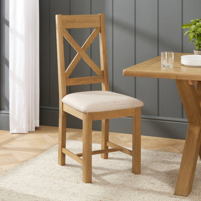 The Furniture Market Cotswold Rustic Smoked Oak Cross Back Dining Chair With Natural Fabric Seat from B&Q