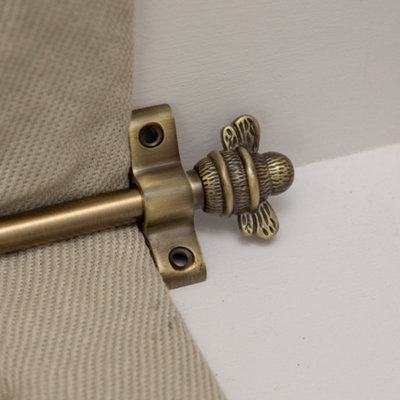 Brass bee Antique Brass Stair Rod Finials 900mm With Bee Design from B&Q