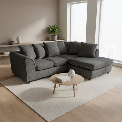 Abakus Direct Jumbo Chenille Corner Sofa In Black Right Facing With Plush Chaise Extension from B&Q