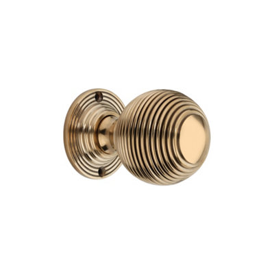 Spira Brass Reeded 60mm Rim/mortice Door Knob from B&Q