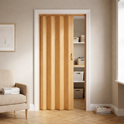 Novecrafto Pvc Folding Door 82 X 203 Cm Space Saving Moisture Resistant Concertina Door With Smooth Glide And Magnetic Closure Brown Oak from B&Q