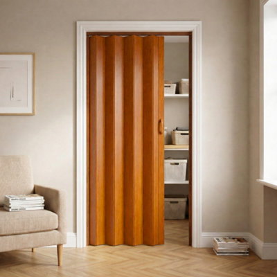 Novecrafto Pvc Folding Door 82 X 203 Cm Space Saving Moisture Resistant Concertina Door With Smooth Glide And Magnetic Closure Gunstock Oak from B&Q