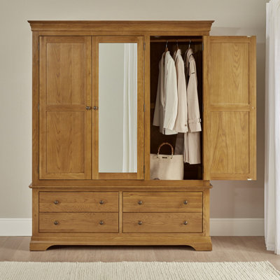 The Furniture Market French Louis Oak 3 Door Triple Wardrobe With Mirror And 4 Drawers from B&Q