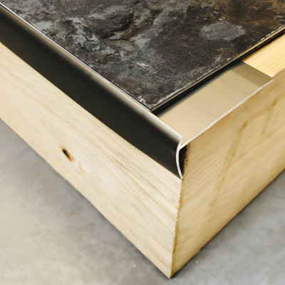 Genesis Tvn Aluminium Angle Stair Nosing Edge For 5mm Lvt 2.7M 1.8M 0.9MMatt Black0.895M from B&Q