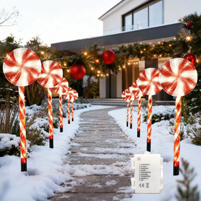 B&Q -  72 Led Outdoor Red Lollipop Candy Cane Set Of 4Battery Operated8 ModesTimer63Cm