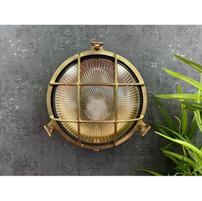 Lampfix Navigator 05841 Outdoor Ip64 1 Light  Small Porthole Bulkhead Light In A Raw Brass Finish from B&Q