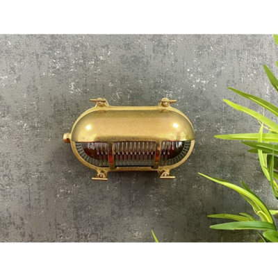 Lampfix Navigator 05843 Outdoor Ip64 1 Light Eyelid Bulkhead Light In A Raw Brass Finish from B&Q