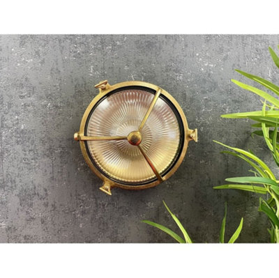 Lampfix Navigator 09611 Outdoor Ip64 1 Light Trident Porthole Bulkhead Light In A Raw Brass Finish from B&Q
