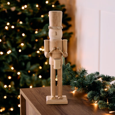 Shop Christmas table decorations.