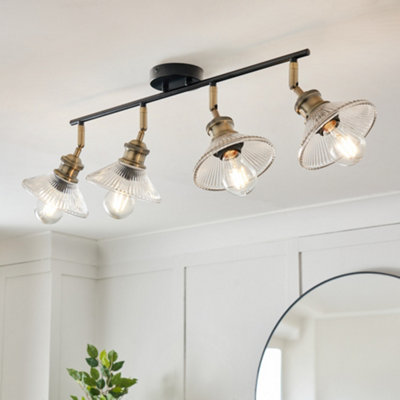 Litecraft Safie 4 Light Antique Brass Industrial Style Ceiling Spotlight Bar from B&Q