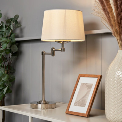 Litecraft Saffron Polished Nickel Swing Arm Table Lamp from B&Q