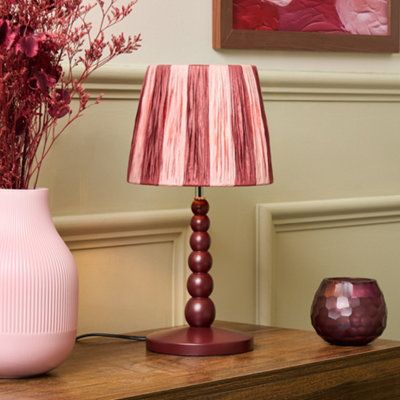 Litecraft Dolly Pink Wooden Bobble Table Lamp With Raffia Shade from B&Q