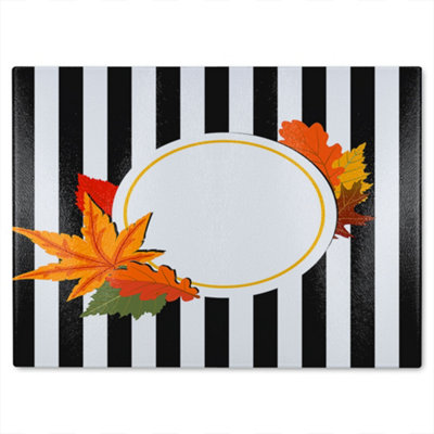 B&Q -  Black Stripes Autumn Leaves Glass Chopping Board