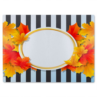 B&Q -  Orange & Red Autumn Leaves On Black Stripes Glass Chopping Board