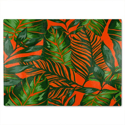 B&Q -  Green Tropical Leaves On Orange Glass Chopping Board