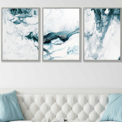 Artze Wall Art Set Of 3 Teal Blue Abstract Ocean Waves Wall Art Prints / 50X70Cm / Light Grey Frame from B&Q
