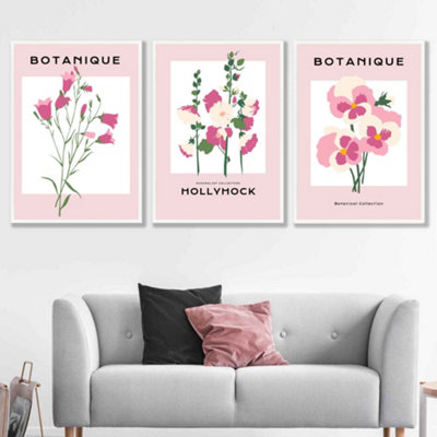 Artze Wall Art Pink Hollyhock Flower Market Set Of 3 Wall Art Prints With White Frame. Size: 50X70Cm from B&Q