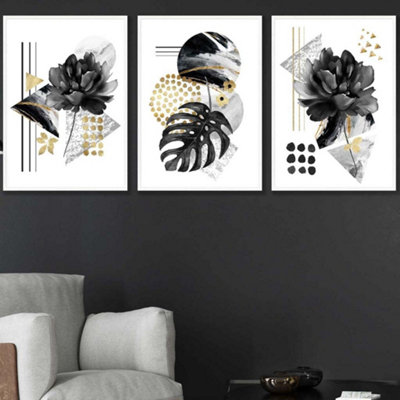 Artze Wall Art Set Of 3 Abstract Black And Gold Botanical Wall Art Prints / 50X70Cm / White Frame from B&Q