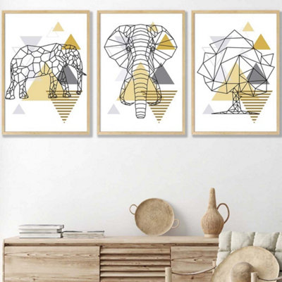 Artze Wall Art Set Of 3 Geometric Line Art Yellow Elephant Tree Set Wall Art Prints / 50X70Cm / Oak Frame from B&Q