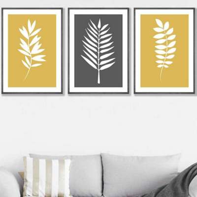 Artze Wall Art Set Of 3 Yellow Grey Graphical Leaves Wall Art Prints / 50X70Cm / Dark Grey Frame from B&Q