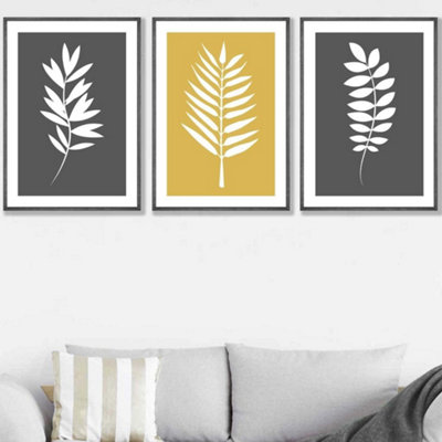 Artze Wall Art Set Of 3 Grey Yellow Graphical Leaves Wall Art Prints / 50X70Cm / Dark Grey Frame from B&Q