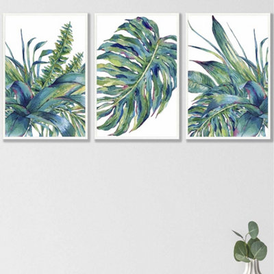 Artze Wall Art Set Of 3 Framed Blue Green Watercolour Tropical Leaves Wall Art Prints / 42X59Cm (A2) / White Frame from B&Q