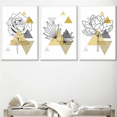 Artze Wall Art Set Of 3 Framed Yellow And Grey Geometric Flowers Wall Art Prints / 50X70Cm / White Frame from B&Q