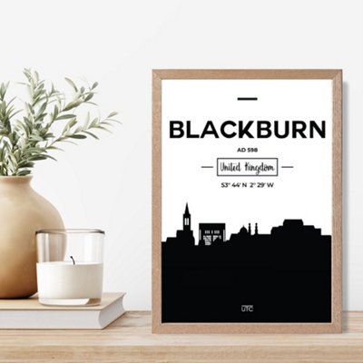 Artze Wall Art Blackburn Black And White City Skyline Framed Print Size: A4 With Oak Frame from B&Q