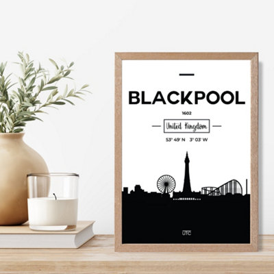 Artze Wall Art Blackpool Black And White City Skyline Framed Print Size: A4 With Oak Frame from B&Q