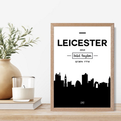 Artze Wall Art Leicester Black And White City Skyline Framed Print Size: A4 With Oak Frame from B&Q