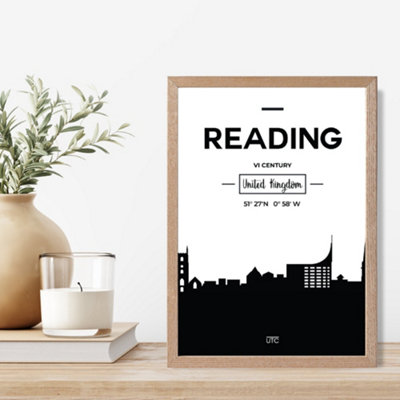 Artze Wall Art Reading Black And White City Skyline Framed Print Size: A4 With Oak Frame from B&Q
