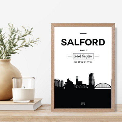 Artze Wall Art Salford Black And White City Skyline Framed Print Size: A4 With Oak Frame from B&Q