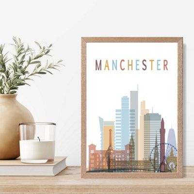Artze Wall Art Manchester Colourful City Skyline Framed Print Size: A4 With Oak Frame from B&Q