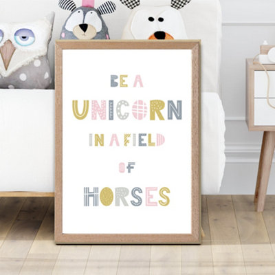 Artze Wall Art Cute Be A Unicorn Pink Scandi Quote Framed Print Size: A2 With Oak Frame from B&Q