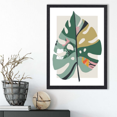 Artze Wall Art Monstera Leaf Green And Red Minamilist Framed Print Size: A3 With Black Frame from B&Q