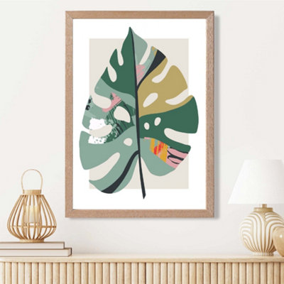 Artze Wall Art Monstera Leaf Green And Red Minamilist Framed Print Size: A3 With Oak Frame from B&Q