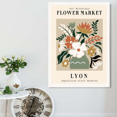 Artze Wall Art Lyon Beige And Green Flower Market Exhibition Framed Print Size: A2 With White Frame from B&Q