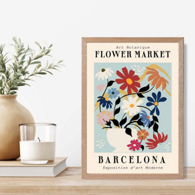 Artze Wall Art Barcelona Blue And Pink Flower Market Exhibition Framed Print Size: A4 With Oak Frame from B&Q