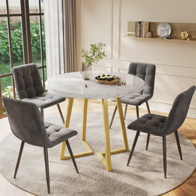 Btm 5 Piece Round Dining Set White Mdf Table Top 80Cm With Gold Legs And Four Grey Velvet Chairs from B&Q