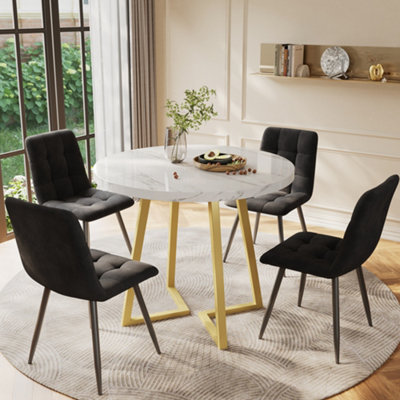 Btm 5 Piece Round Dining Set White Mdf Table Top 80Cm With Gold Legs And Four Black Velvet Chairs from B&Q