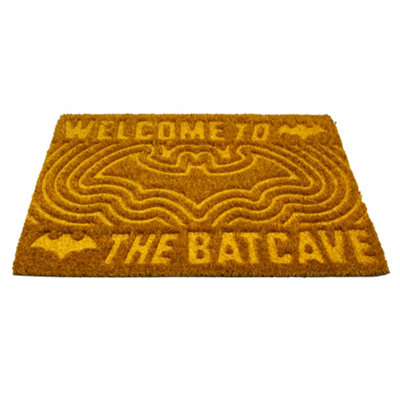 DC comics Batman Welcome To The Batcave Embossed Door Mat Brown/yellow (One Size) from B&Q