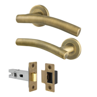 Afit Brass Door Handles Round Rose1 Pair Of Antique Brass Curved Internal Lever Handles And Latch 64mmArco Range from B&Q