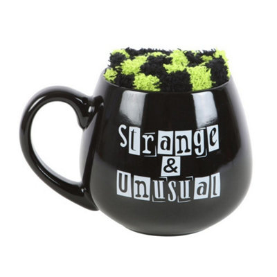 Something Different Strange And Unusual Mug And Sock Set Black/green (One Size) from B&Q