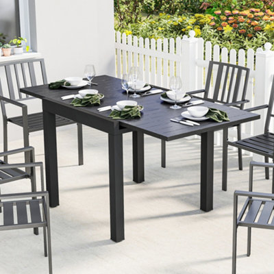Outsunny Aluminium Extending Garden Table With Faux Wood Slatted TopBlack from B&Q