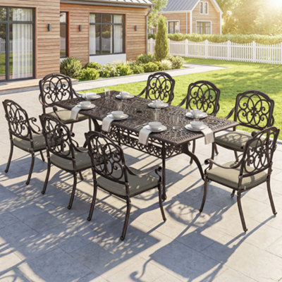 B&Q -  9 Piece Cast Aluminium Garden Dining Set With CushionsBronze Tone