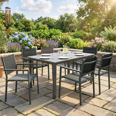 Outsunny Garden Dining Set With Acacia Wood Table TopStackable Chairs from B&Q