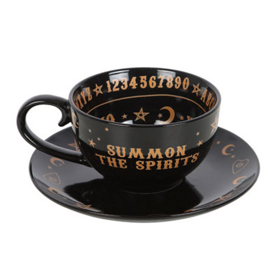 Something Different Talking Board Teacup & Saucer Set Black/gold (One Size) from B&Q