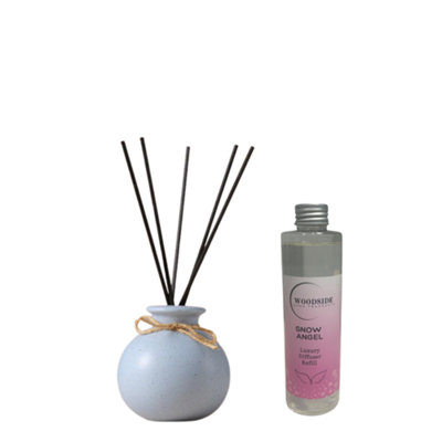 Woodside Pastel Blue Round Ceramic Reed Diffuser Vase With Woodside Luxury RefillSnow Angel from B&Q