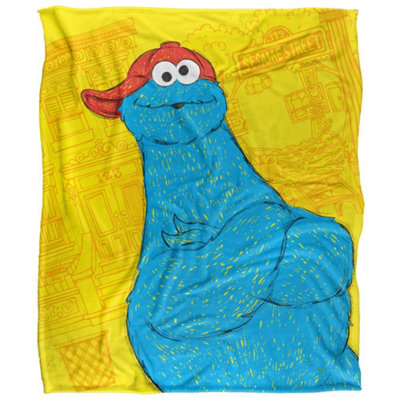 Sesame Street On The Streets Silky Cookie Monster Supersoft Blanket Yellow/blue (One Size) from B&Q