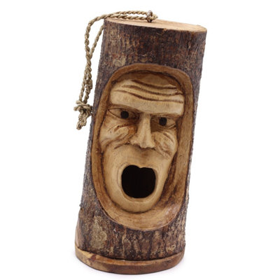 Hand-Carved Tree Trunk Bird House With Grumpy Old Man Face from B&Q